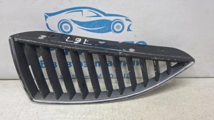 Решетка радиатора левая Mitsubishi Lancer 2003-2009