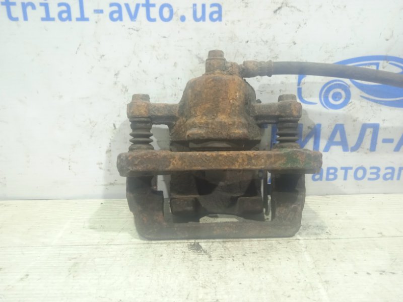 Суппорт задний правый Tucson 2004-2009 JM