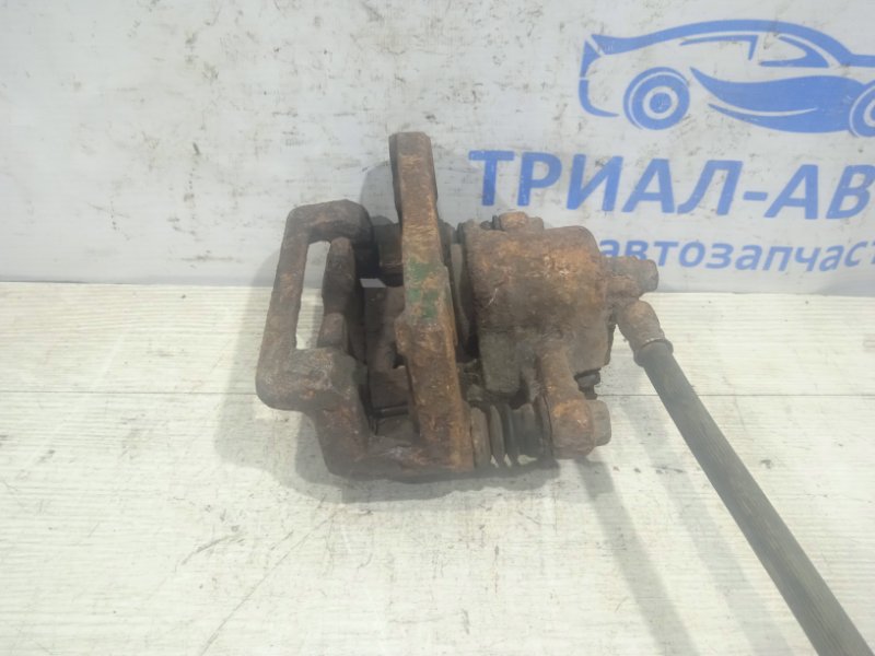Суппорт задний правый Hyundai Tucson JM
