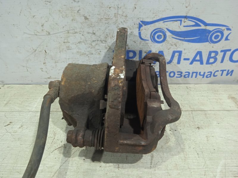 Суппорт передний правый Hyundai Tucson JM