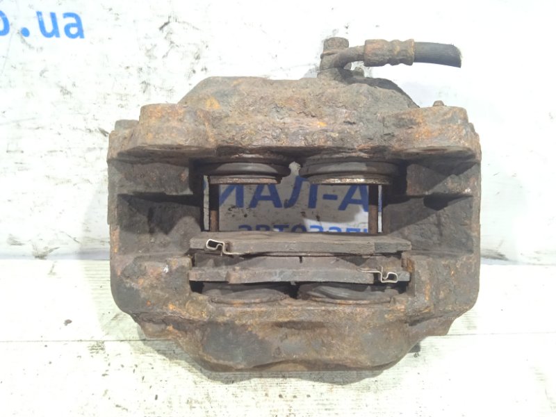 Суппорт передний левый Land Cruiser 1998-2007 J100