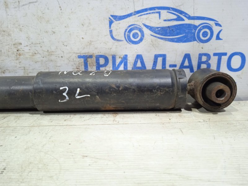 Амортизатор задний задний левый Qashqai 2006-2013 J10