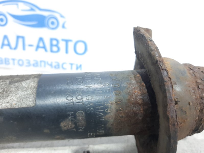 Амортизатор передний левый L200 2006-2015 KB 2.5 Diesel