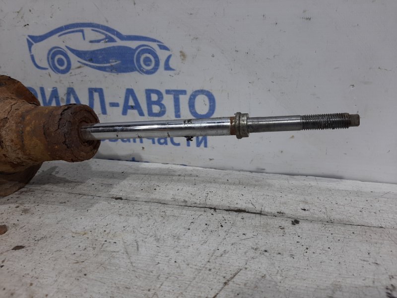 Амортизатор передний левый Mitsubishi L200 KB 2.5 Diesel