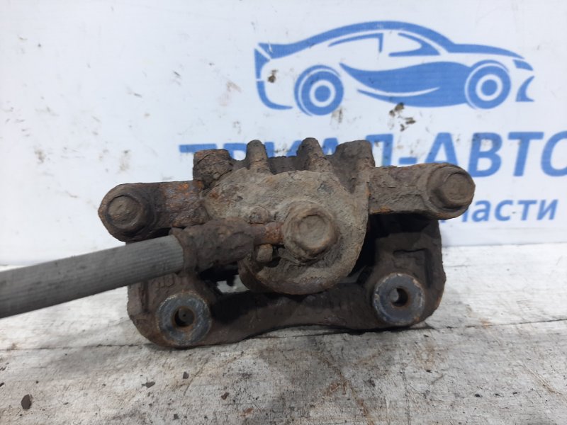 Суппорт задний левый Tucson 2004-2009 JM 2.0 diesel D4EA МКПП