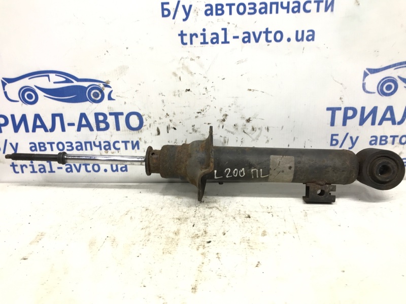 Амортизатор передний левый L200 2006-2015 KB 2.5 дизель 4D56U МКПП