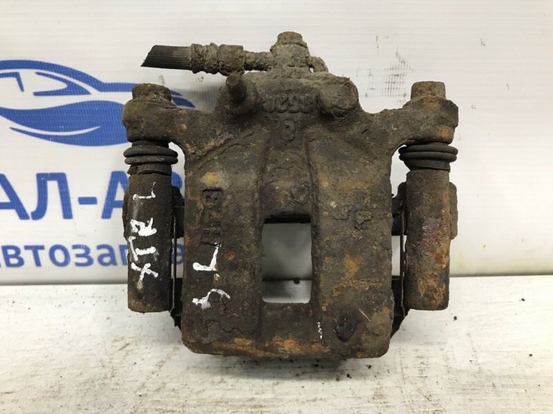 Суппорт задний левый Nissan X-Trail 2007-2014 T31 2.0 Diesel M9R 44011JG00A Б/У