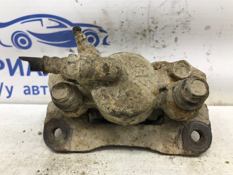 Суппорт задний правый Mitsubishi Pajero Sport K9 2.5 Diesel 4D56