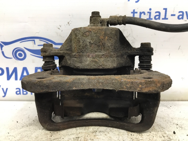 Суппорт передний правый Tucson 2004-2009 JM 2.0 diesel D4EA МКПП