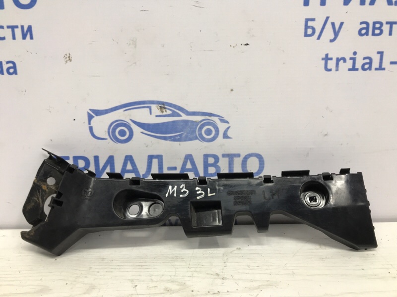 Запчасть кронштейн бампера задний левый Mazda 3 2013-2019 BM 2.2 diesel BHN9502J1 Б/У Кронштейн бампера задний левый Mazda 3 2013-2019 BM 2.2 diesel BHN9502J1 Б/У