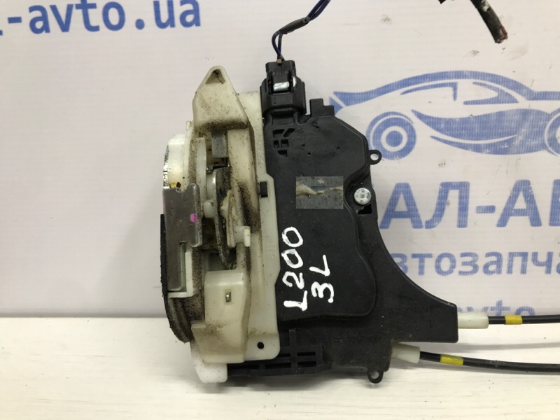 Замок двери задний левый L200 2006-2015 KB 2.5 дизель 4D56U