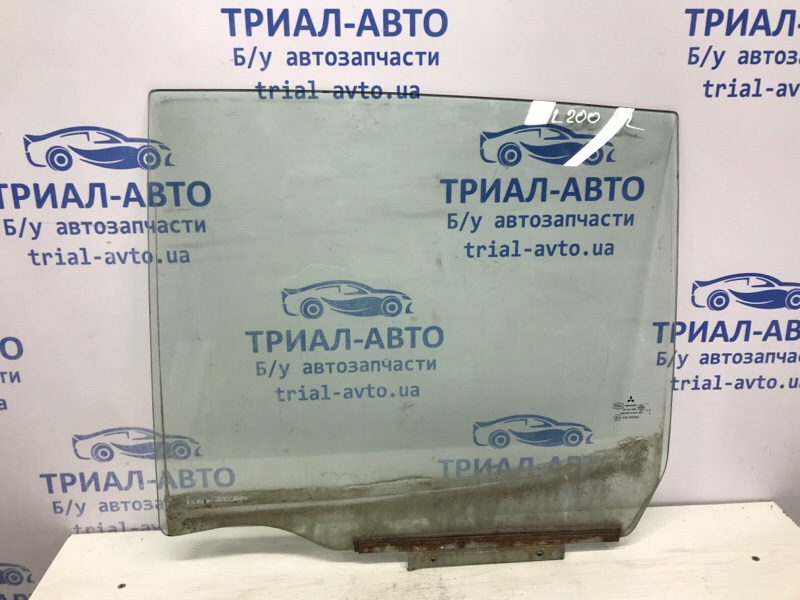Запчасть стекло двери заднее левое Mitsubishi L200 2006-2015 KB 2.5 дизель 4D56U 5736A007 Б/У Стекло двери заднее левое Mitsubishi L200 2006-2015 KB 2.5 дизель 4D56U 5736A007 Б/У