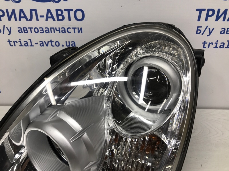 Фара левая галоген Rexton 2006-2012 Y250 2.7 D27DT