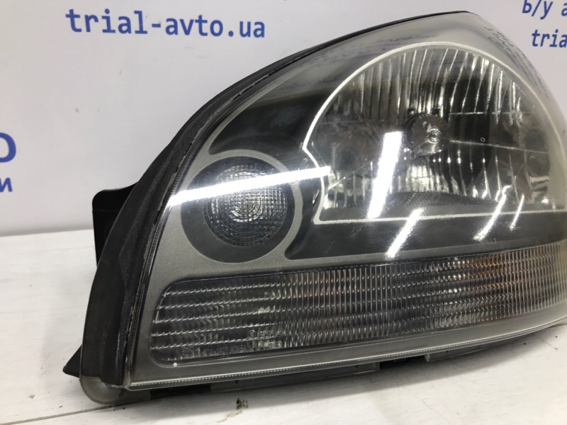 Фара левая галоген Tucson 2004-2009 JM 2.0 diesel D4EA