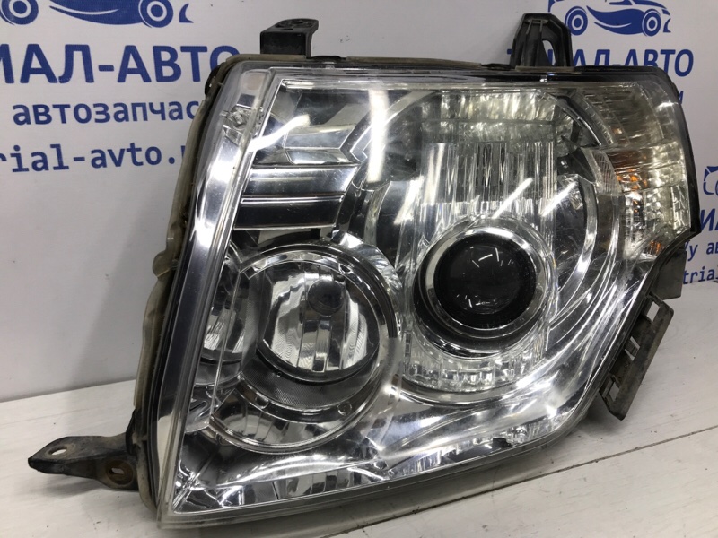Фара левая Ксенон Mitsubishi Pajero Wagon 4 3.2 Дизель 4M41