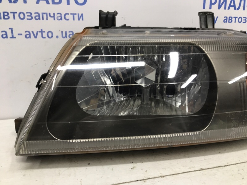Фара левая галоген Pajero Sport 1996-2008 K9 2.5 Diesel 4D56