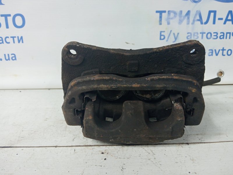 Суппорт передний левый Outback 2009-2014 BR 2.5 бензин Ej253