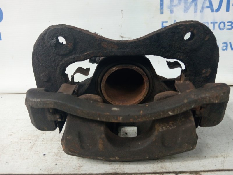 Суппорт передний левый Tucson 2004-2009 JM 2.0 diesel D4EA