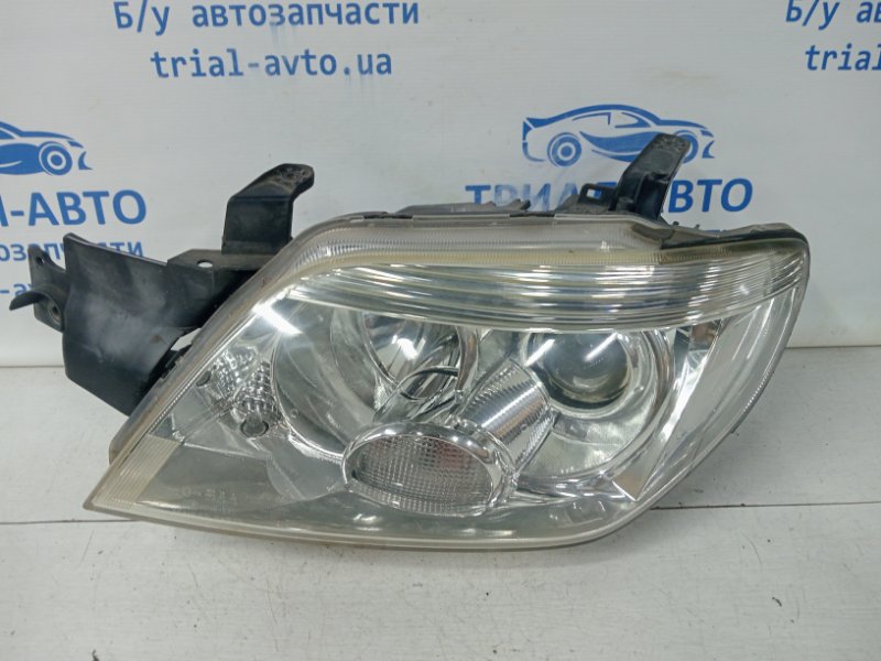 Фара левая Outlander 2003-2008 cu 2.4 бензин 4G69