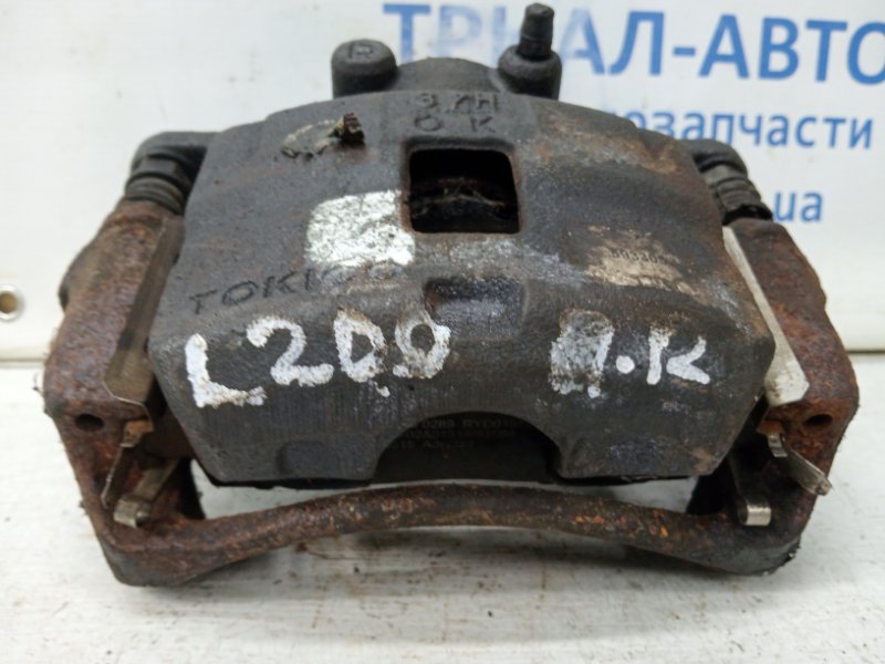 Суппорт передний правый L200 2006-2015 KB 2.5 Diesel 4D56
