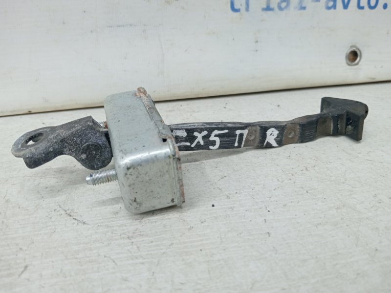 Ограничитель двери передний правый Mazda CX 5 2011-2017 KE 2.2 diesel KD5358270C Б/У