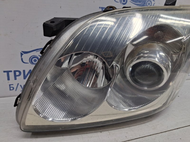 Фара левая галоген Avensis 2002-2010 T25 1.8 бензин 1ZZFE