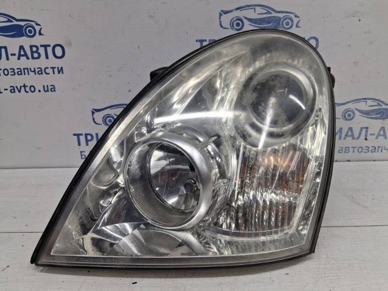 Фара левая галоген SsangYong Rexton 2006-2012 Y250 2.7 D27DT 8310108B44 Б/У