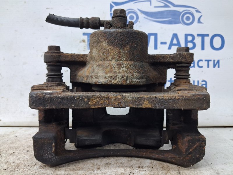 Суппорт передний левый SX4 2006-2014 1 2.0 Бензин J20A