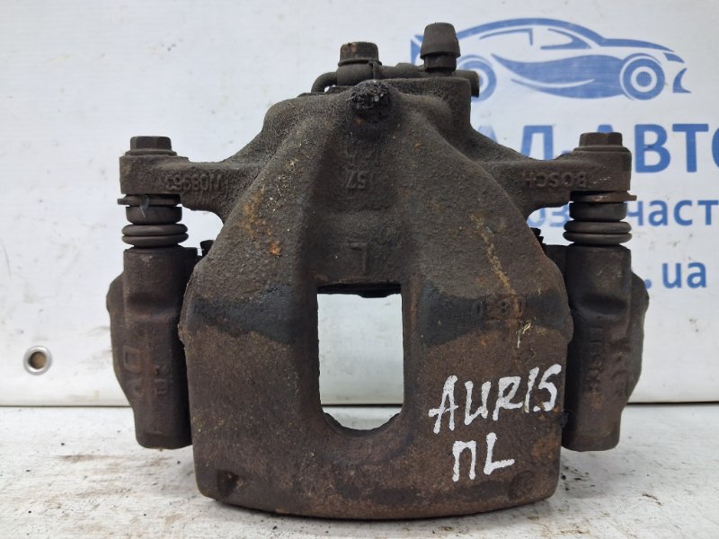 Суппорт передний левый Toyota Auris 2006-2012 E150 1.6 бензин 1ZRFAE 4775002341 Б/У