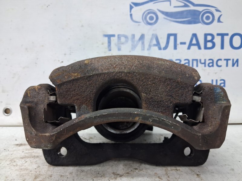 Суппорт передний левый Auris 2006-2012 E150 1.6 бензин 1ZRFAE