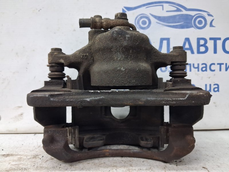 Суппорт передний левый Auris 2006-2012 E150 1.6 бензин 1ZRFAE