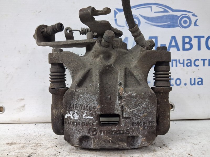 Суппорт задний левый Mazda 3 2013-2019 BM 2.2 diesel B4Y72699ZA Б/У