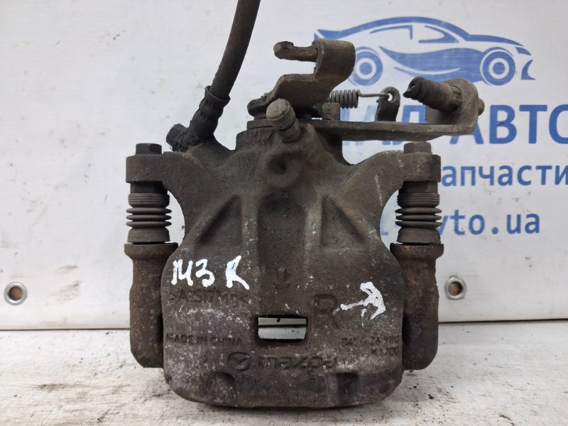 Суппорт задний правый Mazda 3 2013-2019 BM 2.2 diesel B4Y72698ZA Б/У