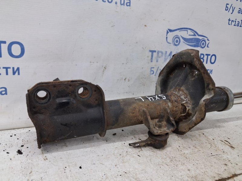 Амортизатор передний левый Suzuki SX4 1 2.0 Бензин J20A