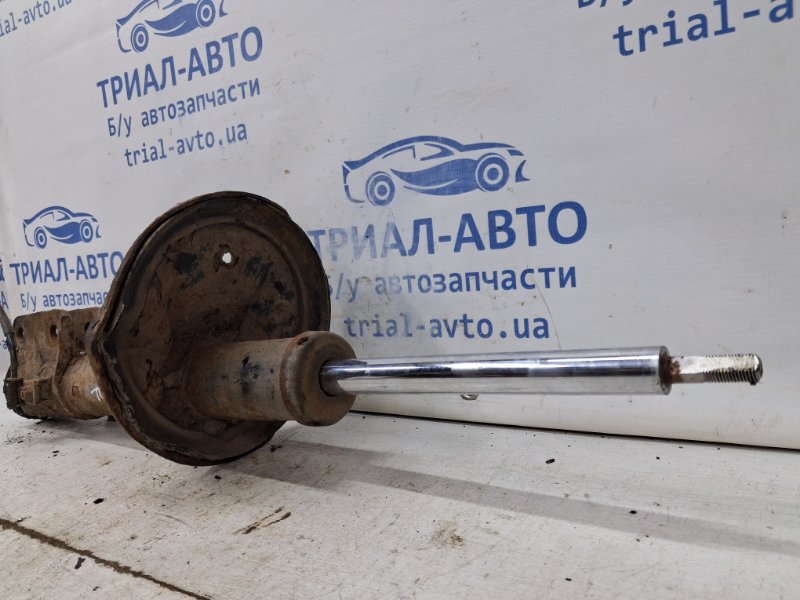 Амортизатор задний левый Tucson 2004-2009 JM 2.0 diesel D4EA Амортизатор задний левый Tucson 2004-2009 JM 2.0 diesel D4EA