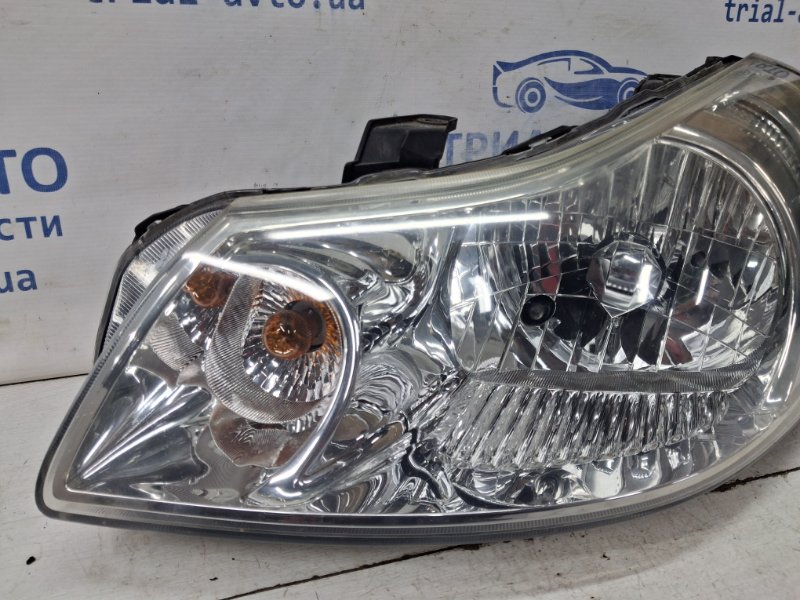 Фара левая галоген Suzuki SX4 1 1.6 бензин M16A