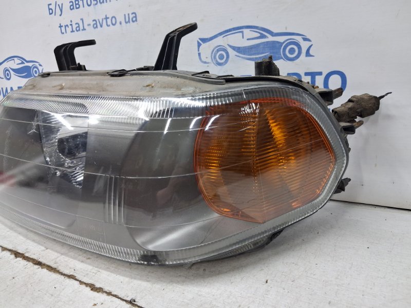 Фара левая галоген Pajero Sport 1996-2008 K9 3.0 бензин 6G72 Фара левая галоген Pajero Sport 1996-2008 K9 3.0 бензин 6G72