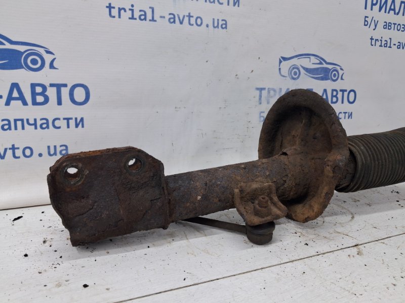 Амортизатор передний левый Suzuki SX4 1 1.6 бензин M16A