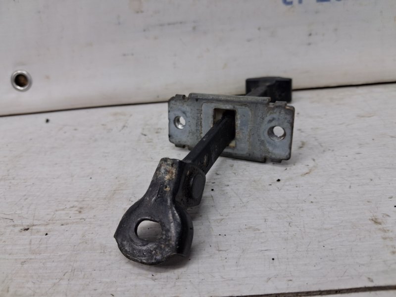 Ограничитель двери передний левый 3 2003-2009 BK 1.6 бензин Z6