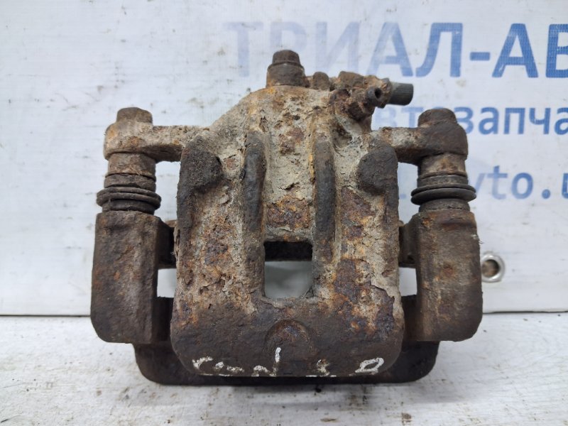 Запчасть суппорт задний правый Hyundai Sonata 2004-2010 NF 2.4 бензин G4KC 582303K050 Б/У Суппорт задний правый Hyundai Sonata 2004-2010 NF 2.4 бензин G4KC 582303K050 Б/У