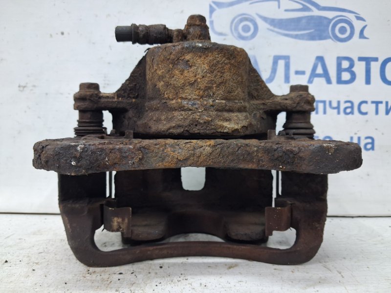 Суппорт передний левый Tucson 2004-2009 JM 2.0 diesel D4EA Суппорт передний левый Tucson 2004-2009 JM 2.0 diesel D4EA