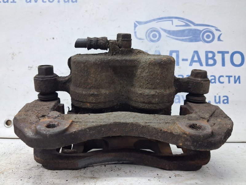 Суппорт передний левый Outlander 2003-2006 cu 2.4 бензин 4G69