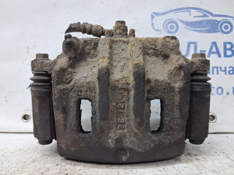 Суппорт передний правый Kia Sorento 2002-2011 BL 2.5 diesel D4CB 581303E600 Б/У