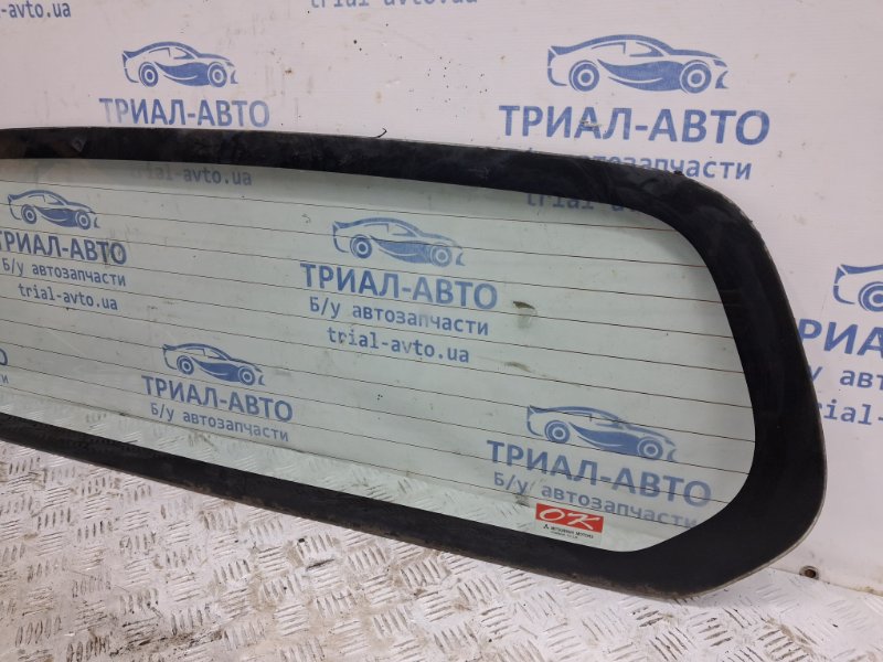 Стекло в кузов заднее Mitsubishi L200 KB 2.5 Diesel 4D56