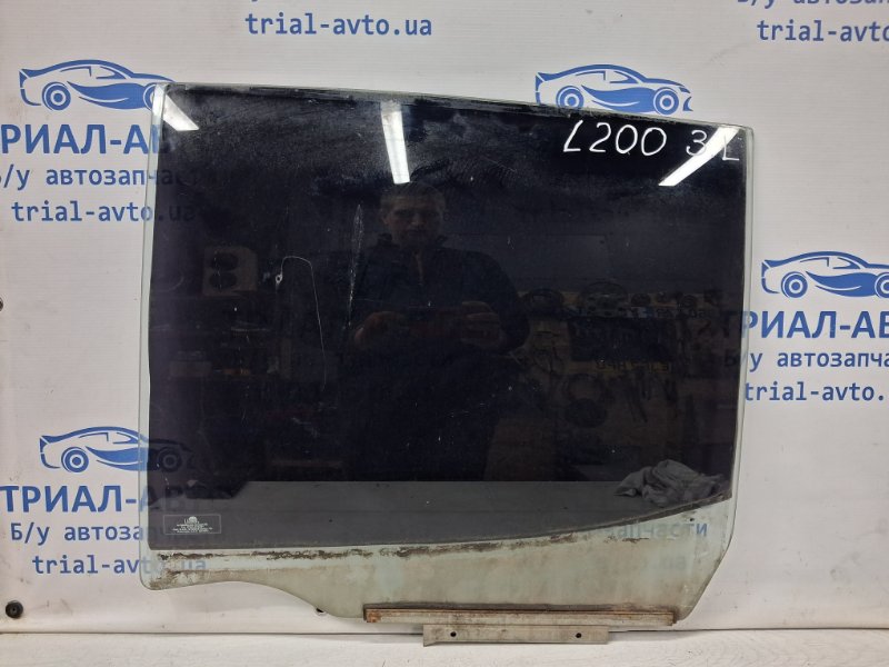 Запчасть стекло двери заднее левое Mitsubishi L200 2006-2015 KB 2.5 Diesel 4D56 5736A007 Б/У Стекло двери заднее левое Mitsubishi L200 2006-2015 KB 2.5 Diesel 4D56 5736A007 Б/У