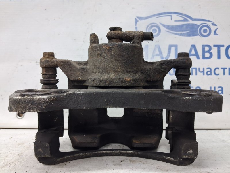 Суппорт передний левый L200 2006-2015 KB 2.5 Diesel 4D56