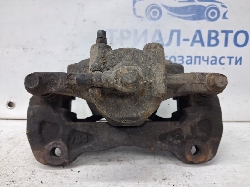 Суппорт передний правый Mitsubishi L200 KB 2.5 Diesel 4D56