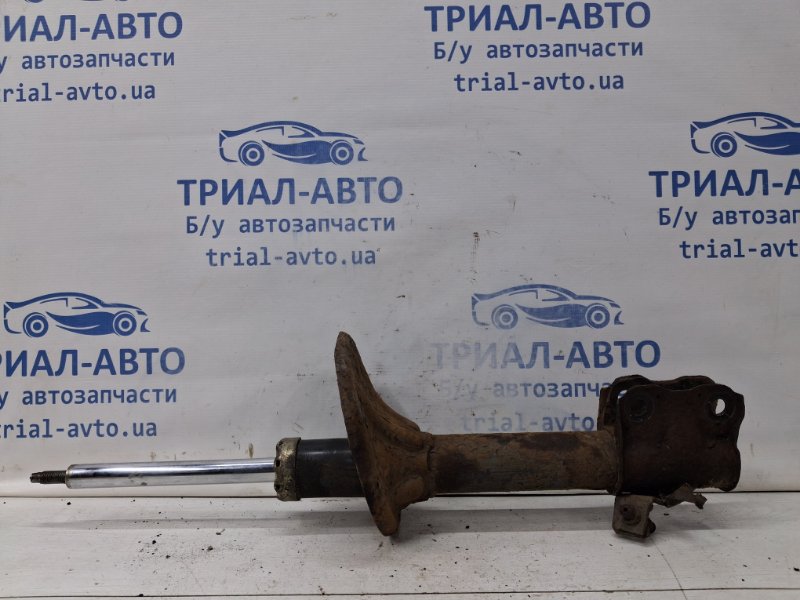 Амортизатор передний левый Outlander 2003-2006 cu 2.4 бензин 4G69