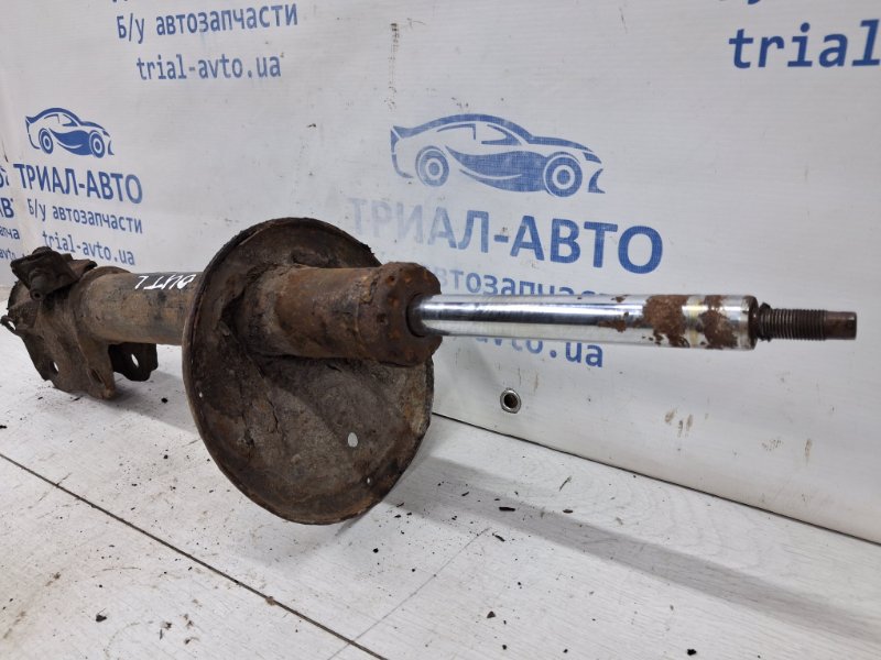 Амортизатор передний левый Outlander 2003-2006 cu 2.4 бензин 4G69