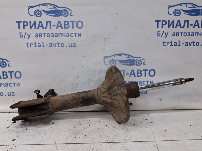 Амортизатор передний левый Outlander 2003-2006 cu 2.4 бензин 4G69